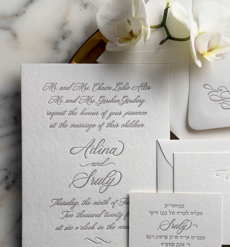 Understated elegance with our Luxe Letterpress invite in gray ink.